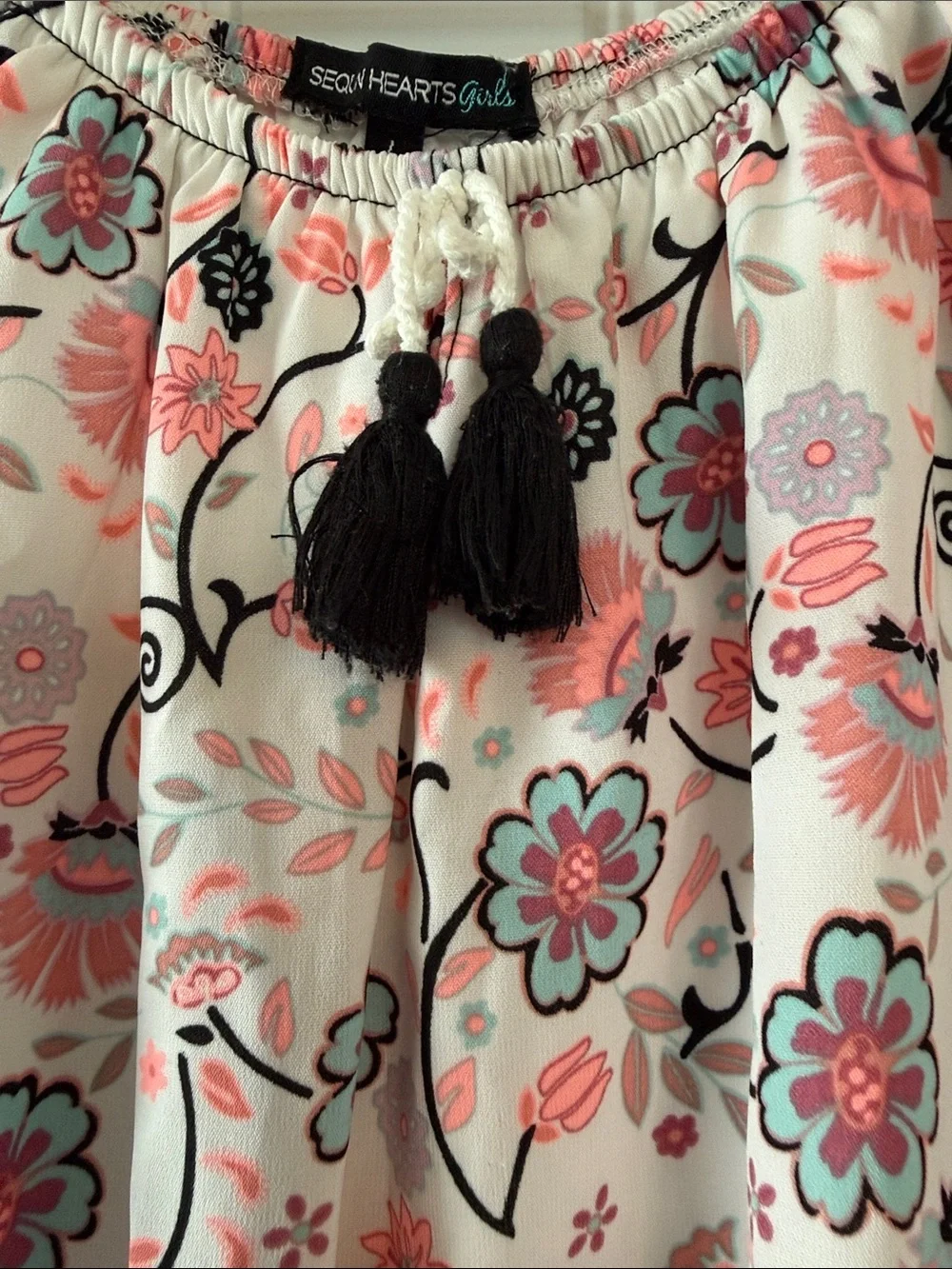 Gently worn Girls Floral Tassel Romper
